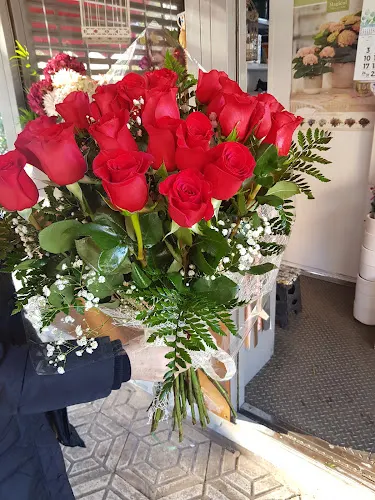 Floristeria Capricho escudo